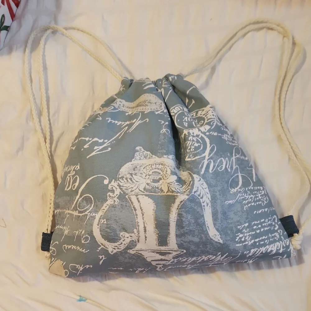 Elegant Blue Script Drawstring Backpack - Picture 3 of 4